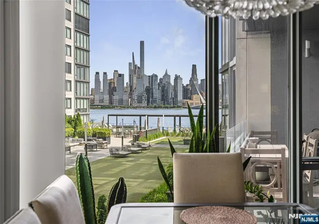 Photo 1 of Condo for sale at 9 Ave At Port Imperial #414, West New York, NJ 07093 | MLS# 26027818 | Listing updated on 2026-08-22