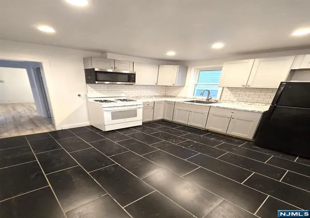 Multi family home for sale at 14 Triton Ter, Newark, NJ 07104 | MLS# 26028059