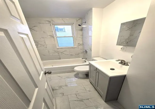Photo 2 of Multi family home for sale at 14 Triton Ter, Newark, NJ 07104 | MLS# 26028059 | Listing updated on 2026-08-06