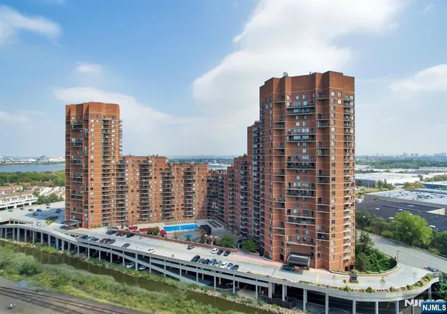 Photo 2 of Condo for sale at 418 Harmon Cove Tower, Secaucus, NJ 07094 | MLS# 26028442 | Listing updated on 2026-08-25