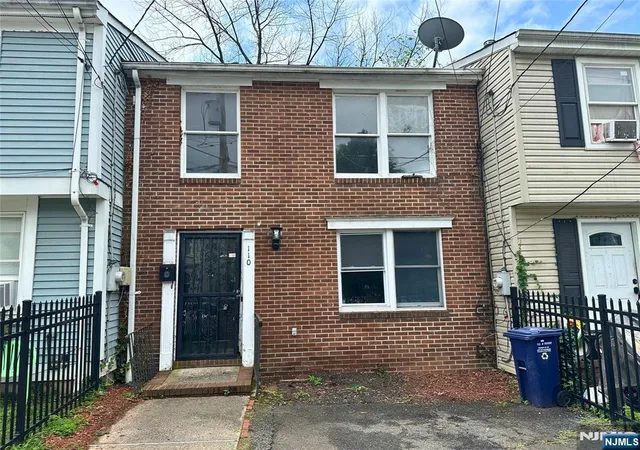 Photo 1 of Single family home for sale at 110 112 Pearl St, Paterson, NJ 07501 | MLS# 26028711 | Listing updated on 2026-08-27