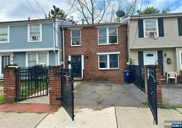 Photo 2 of Single family home for sale at 110 112 Pearl St, Paterson, NJ 07501 | MLS# 26028711 | Listing updated on 2026-08-27
