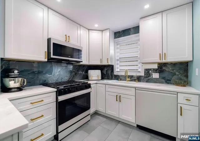 Photo 2 of Multi family home for sale at 69 Main Ave, Wallington, NJ 07057 | MLS# 26028930 | Listing updated on 2026-08-10