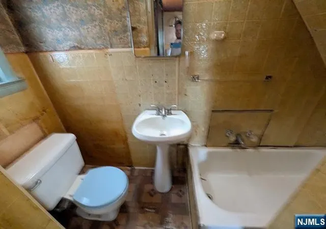 Photo 3 of Single family home for sale at 376 Myrtle Ave, Irvington, NJ 07111 | MLS# 26029017 | Listing updated on 2026-09-22