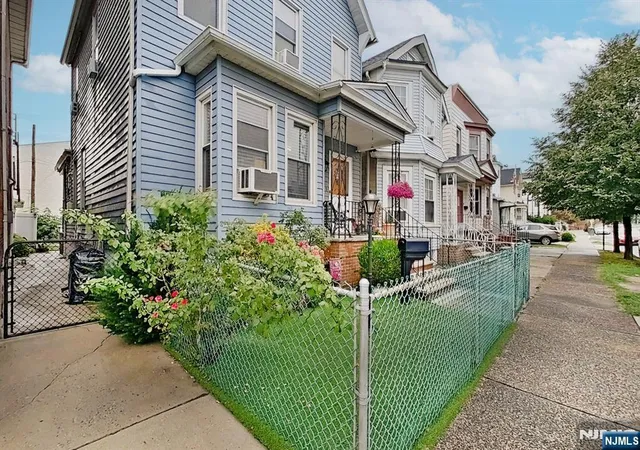 Photo 3 of Sale Pending at 402 Davis Ave, Harrison, NJ 07029 | MLS# 26029100 | Listing updated on 2026-08-27