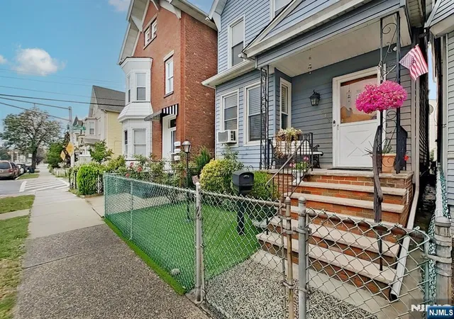 Photo 3 of Sale Pending at 402 Davis Ave, Harrison, NJ 07029 | MLS# 26029100 | Listing updated on 2026-08-27
