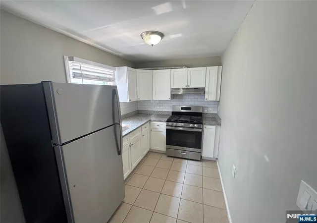 Photo 3 of Sale Pending at 71 Suburbia Ct, Jersey City, NJ 07305 | MLS# 26029134 | Listing updated on 2026-10-08