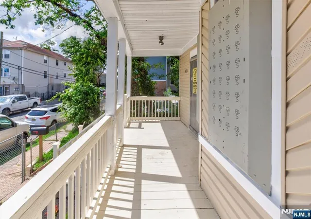 Photo 3 of Single family home for sale at 31-33 Voorhees St, Newark, NJ 07108 | MLS# 26029163 | Listing updated on 2026-08-04