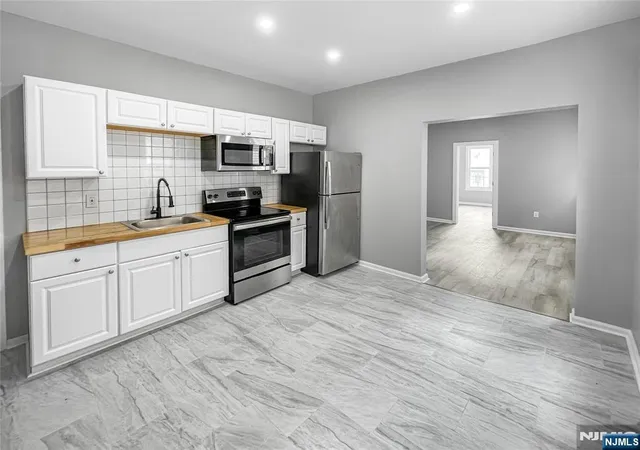 Photo 4 of Multi family home for sale at 9 Patten Pl, Newark, NJ 07112 | MLS# 26029220 | Listing updated on 2026-08-17