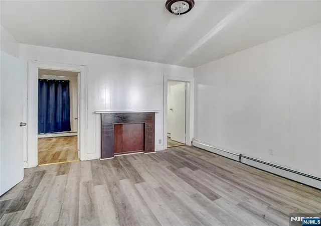 Photo 3 of Multi family home for sale at 54 4th St, Paterson, NJ 07522 | MLS# 26029307 | Listing updated on 2026-08-14