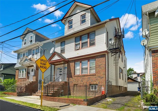Photo 1 of Multi family home for sale at 98 Delmar Pl, Irvington, NJ 07111 | MLS# 26029379 | Listing updated on 2026-09-10