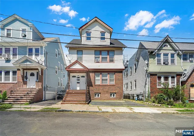 Photo 3 of Multi family home for sale at 98 Delmar Pl, Irvington, NJ 07111 | MLS# 26029379 | Listing updated on 2026-09-10