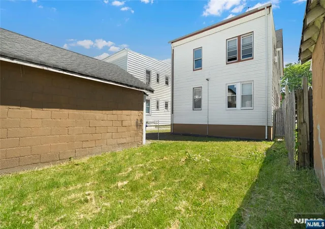 Photo 3 of Multi family home for sale at 98 Delmar Pl, Irvington, NJ 07111 | MLS# 26029379 | Listing updated on 2026-09-10