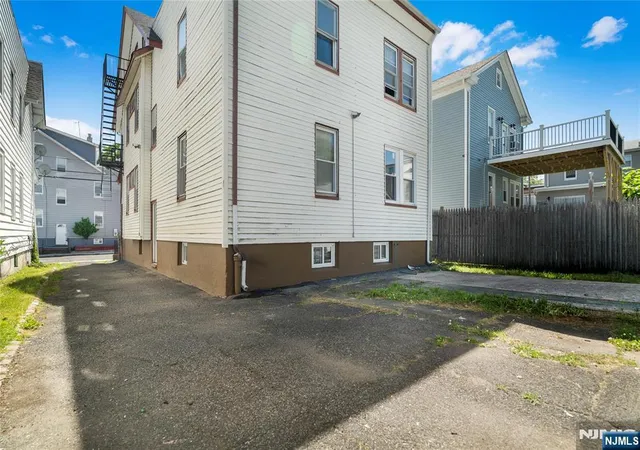 Photo 4 of Multi family home for sale at 98 Delmar Pl, Irvington, NJ 07111 | MLS# 26029379 | Listing updated on 2026-09-10