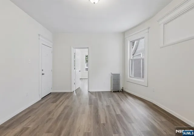 Photo 3 of Multi family home for sale at 19 Nassau Pl, East Orange, NJ 07018 | MLS# 26029816 | Listing updated on 2026-10-09