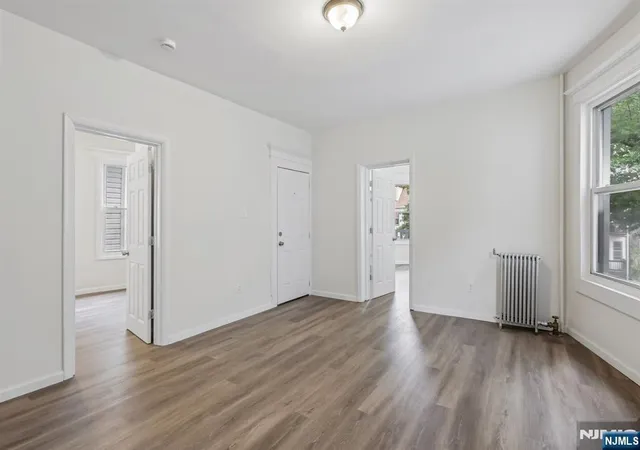Photo 4 of Multi family home for sale at 19 Nassau Pl, East Orange, NJ 07018 | MLS# 26029816 | Listing updated on 2026-10-09