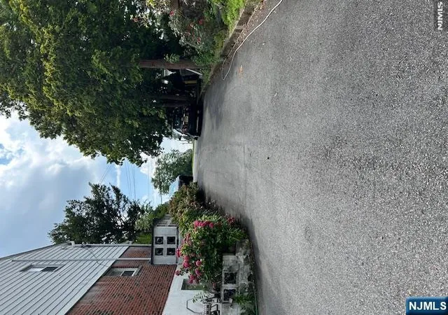 Photo 3 of Single family home for sale at 596 River Rd, New Milford, NJ 07646 | MLS# 26029978 | Listing updated on 2026-10-13
