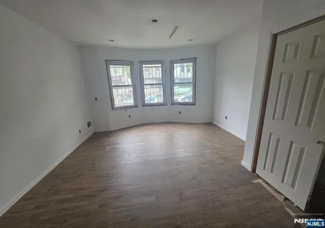 Photo 4 of Multi family home for sale at 135 Brookside Ave, Irvington, NJ 07111 | MLS# 26030356 | Listing updated on 2026-10-08