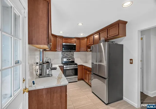 Photo 2 of Single family home for sale at 27 Grayson Pl, Teaneck, NJ 07666 | MLS# 26030511 | Listing updated on 2026-09-16