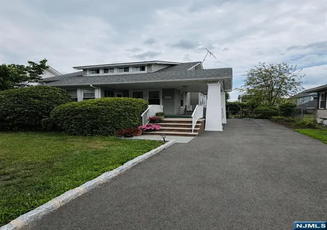 Photo 2 of Single family home for sale at 409 411 25th St, Paterson, NJ 07514 | MLS# 26030751 | Listing updated on 2026-09-15