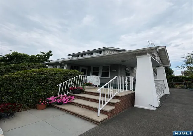 Photo 3 of Single family home for sale at 409 411 25th St, Paterson, NJ 07514 | MLS# 26030751 | Listing updated on 2026-09-15
