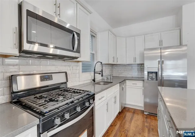 Photo 3 of Single family home for sale at 142 Steuben St, East Orange, NJ 07018 | MLS# 26030782 | Listing updated on 2026-10-13