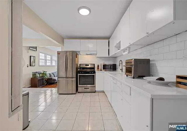Photo 4 of Sale Pending at 323 John St, Harrison, NJ 07029 | MLS# 26030831 | Listing updated on 2026-09-06