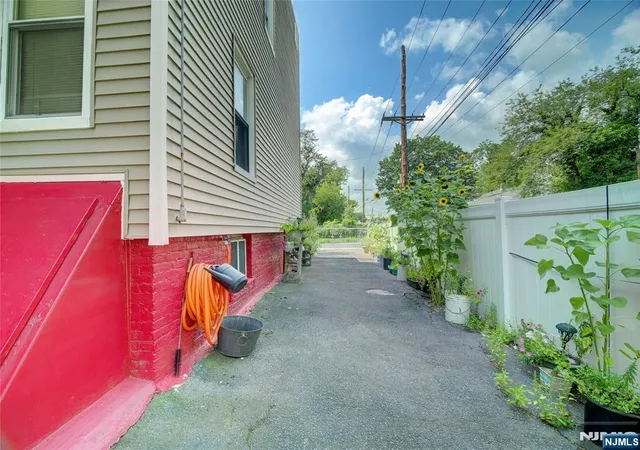 Photo 3 of Multi family home for sale at 22 Kensington Pl, East Orange, NJ 07017 | MLS# 26030917 | Listing updated on 2026-09-06