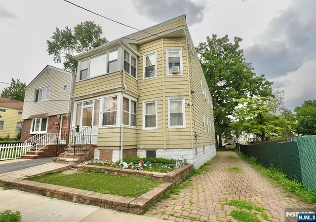 Photo 2 of Multi family home for sale at 32 New St, Belleville, NJ 07109 | MLS# 26031398 | Listing updated on 2026-09-16