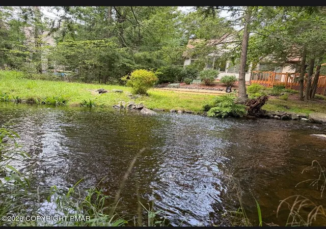 Photo 3 of Single family home for sale at 2208 Hillcrest Dr, Pocono Pines, PA 18350 | MLS# PM-143947 | Listing updated on 2026-09-09