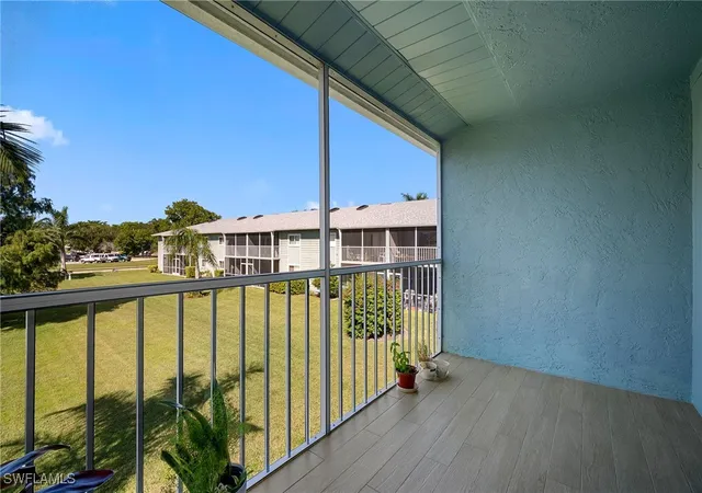 Listing Photo 4 - Condo for sale in building located at 144 Cypress Wy E, Naples, FL 34110 - Unit #707