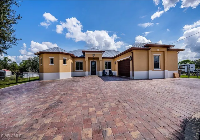 2nd image of 802 Poinsettia Ave, Lehigh Acres, FL 33972 | MLS# 225011100