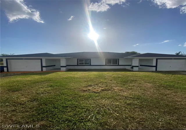 Photo 1 of Multi family home for sale at 116/118 Gordon Ave S, Lehigh Acres, FL 33973 | MLS# 225038713 | Listing updated on 2026-08-19
