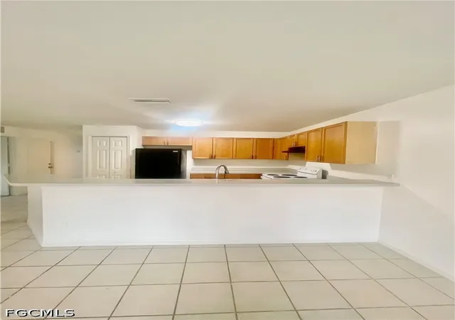 Photo 3 of Multi family home for sale at 116/118 Gordon Ave S, Lehigh Acres, FL 33973 | MLS# 225038713 | Listing updated on 2026-08-19