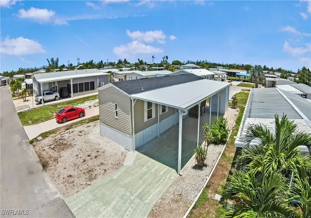 Photo 2 of Manufactured home for sale at 4944 Porky Ln, Saint James City, FL 33956 | MLS# 225056362 | Listing updated on 2026-08-24