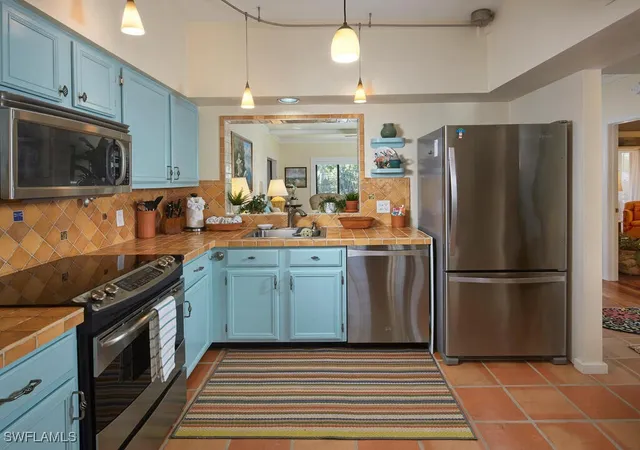 Listing Photo 5 - Condo for sale in building located at 4021 Whiskey Pointe Ln, Bonita Springs, FL 34134 - Unit #202