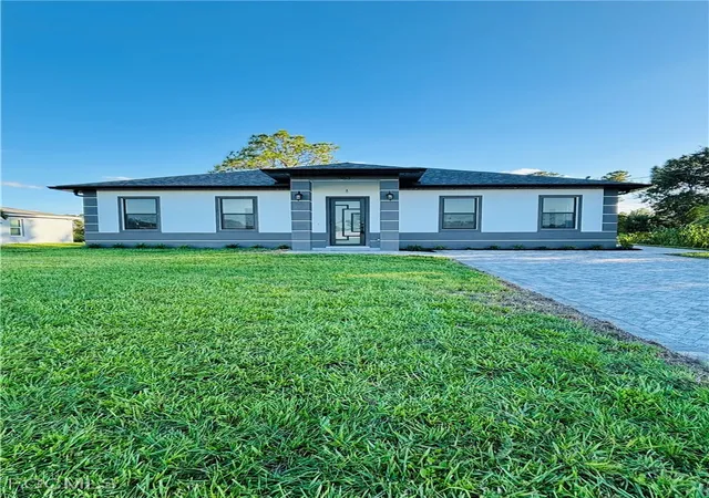 Photo 3 of Single family home for sale at 563 Oakshire Ln, Lehigh Acres, FL 33972 | MLS# 2025015984 | Listing updated on 2026-08-21