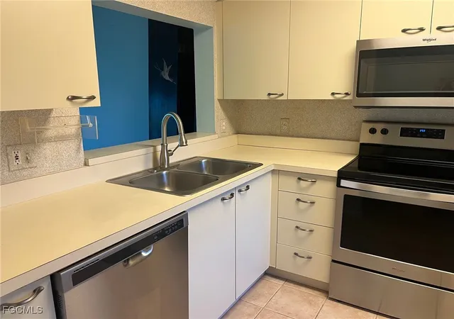 Photo 1 of Condo for sale at 7406 Lake Breeze Dr #118, Fort Myers, FL 33907 | MLS# 2025017170 | Listing updated on 2026-08-19