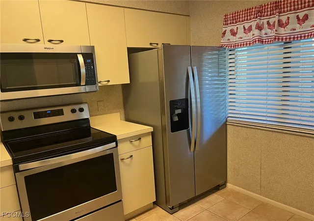 Photo 2 of Condo for sale at 7406 Lake Breeze Dr #118, Fort Myers, FL 33907 | MLS# 2025017170 | Listing updated on 2026-08-19