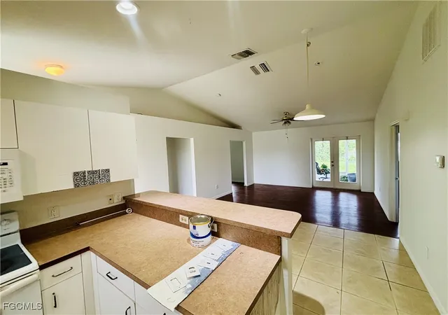Photo 2 of Multi family home for sale at 936 938 Eisenhower Blvd, Lehigh Acres, FL 33974 | MLS# 2025021598 | Listing updated on 2026-08-25