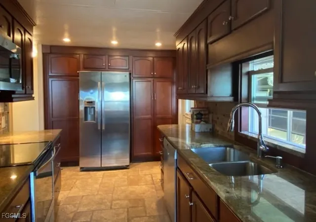 Photo 1 of Manufactured home for sale at 14518 Battery Bnd, North Fort Myers, FL 33917 | MLS# 2025024335 | Listing updated on 2026-08-22