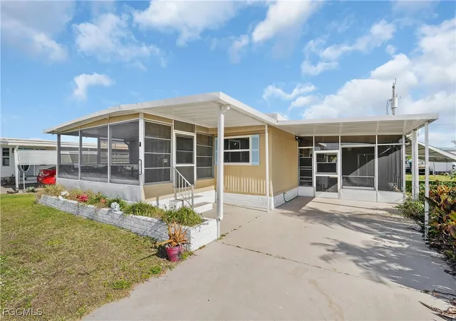 Photo 3 of Manufactured home for sale at 14518 Battery Bnd, North Fort Myers, FL 33917 | MLS# 2025024335 | Listing updated on 2026-08-22