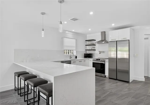 Photo 2 of Single family home for sale at 565 110th Avenue N, Naples, FL 34108 | MLS# 225083225 | Listing updated on 2026-08-26