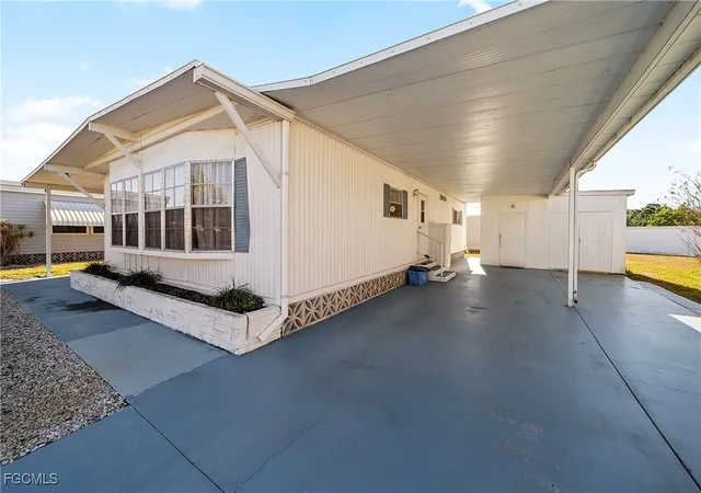 Photo 2 of Manufactured home for sale at 77 Snead Dr, North Fort Myers, FL 33903 | MLS# 2025006954 | Listing updated on 2026-09-24