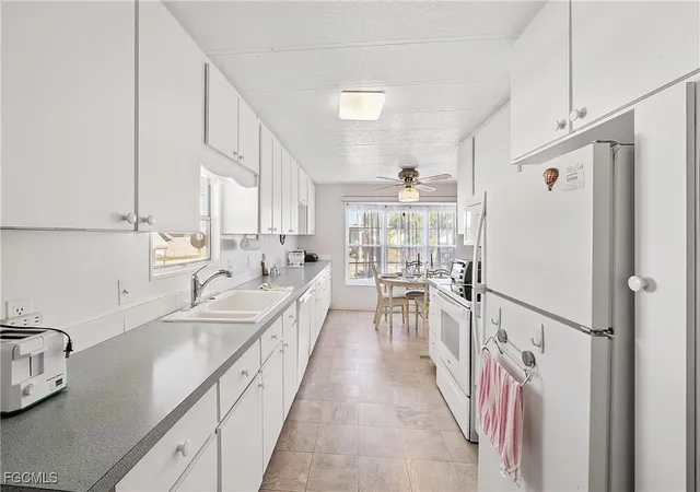 Photo 4 of Manufactured home for sale at 77 Snead Dr, North Fort Myers, FL 33903 | MLS# 2025006954 | Listing updated on 2026-09-24