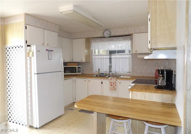 Photo 1 of Manufactured home for sale at 239 Shrub Ln N, North Fort Myers, FL 33917 | MLS# 2026004366 | Listing updated on 2026-10-04