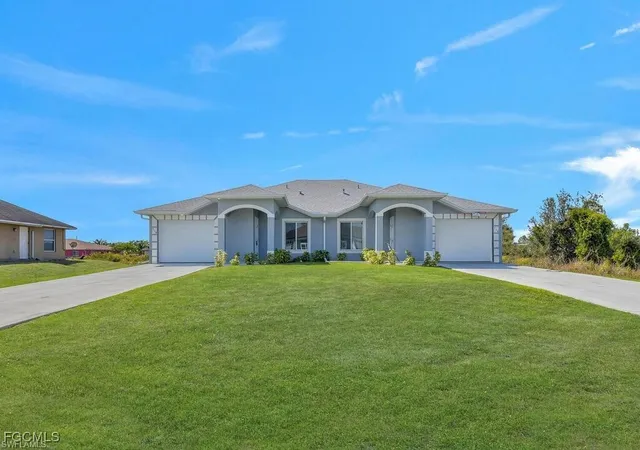 1st image of 716/718 Harry Ave S, Lehigh Acres, FL 33973 | MLS# 2026004921