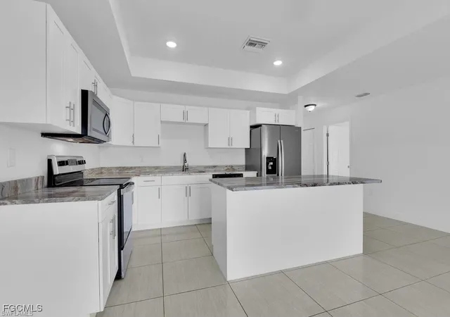 4th image of 716/718 Harry Ave S, Lehigh Acres, FL 33973 | MLS# 2026004921