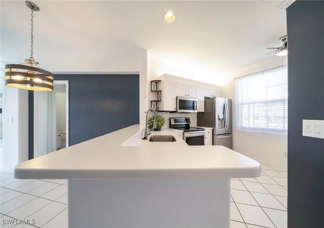 Listing Photo 4 - Condo for sale in building located at 1149 Sweetwater Ln, Naples, FL 34110 - Unit #4102