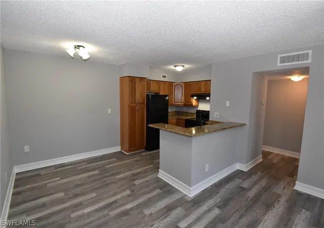 Listing Photo 4 - Condo for sale in building located at 13545 Eagle Ridge Dr, Fort Myers, FL 33912 - Unit #818